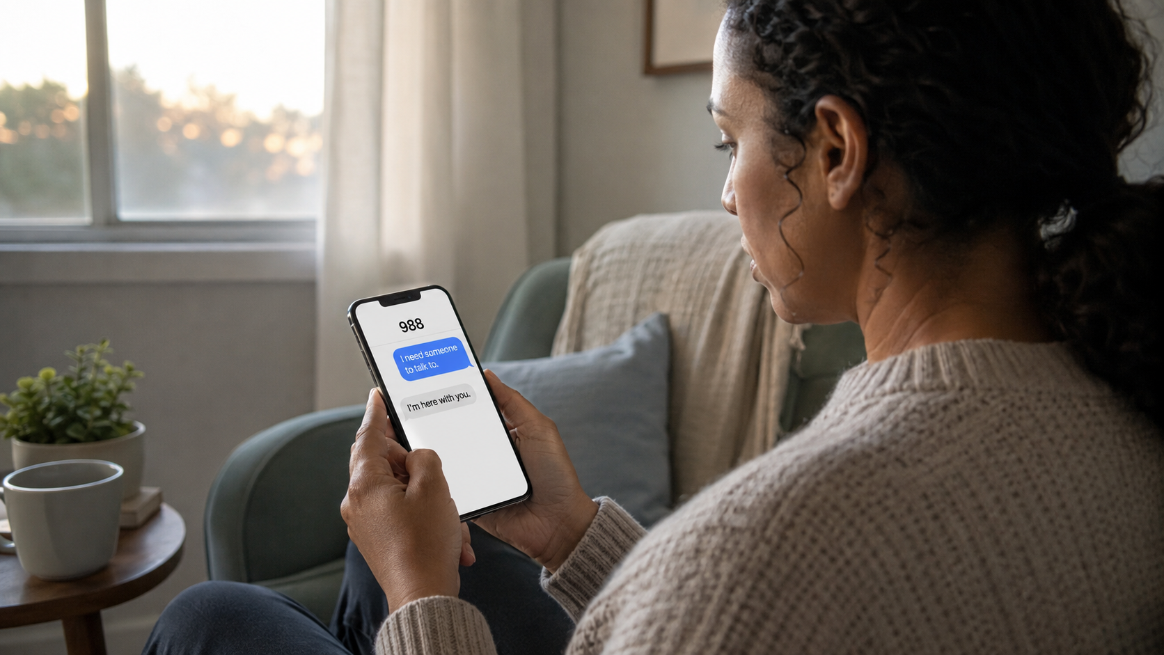 Woman texting 988 and receiving compassionate mental health crisis support